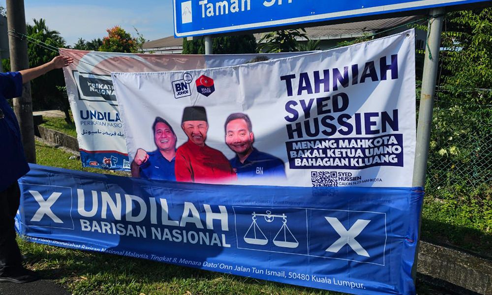 Vibrant Mahkota Polling Day Sees Young Mother Vote and Snack