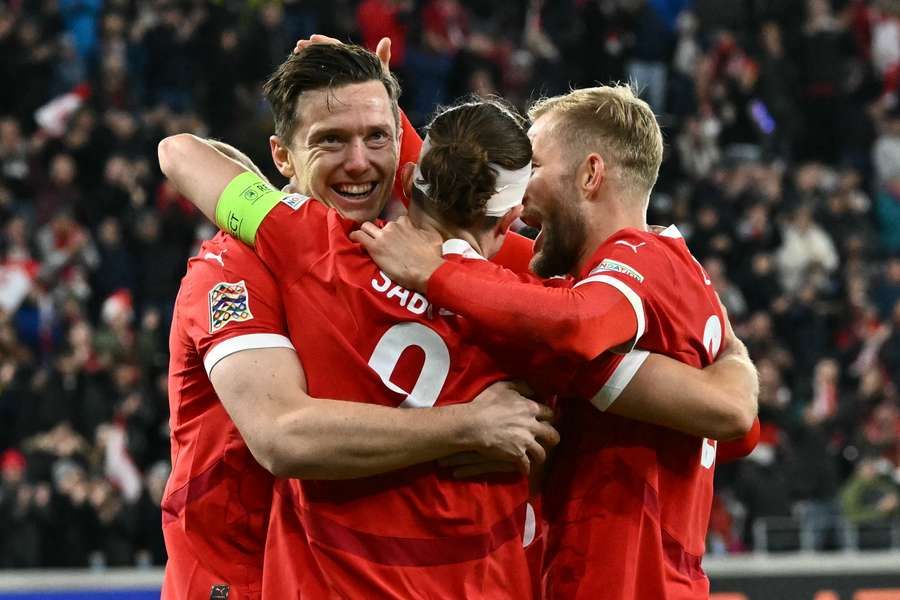 Austria’s Victory Sparks Promotion Hopes Amid Haaland’s Shadow